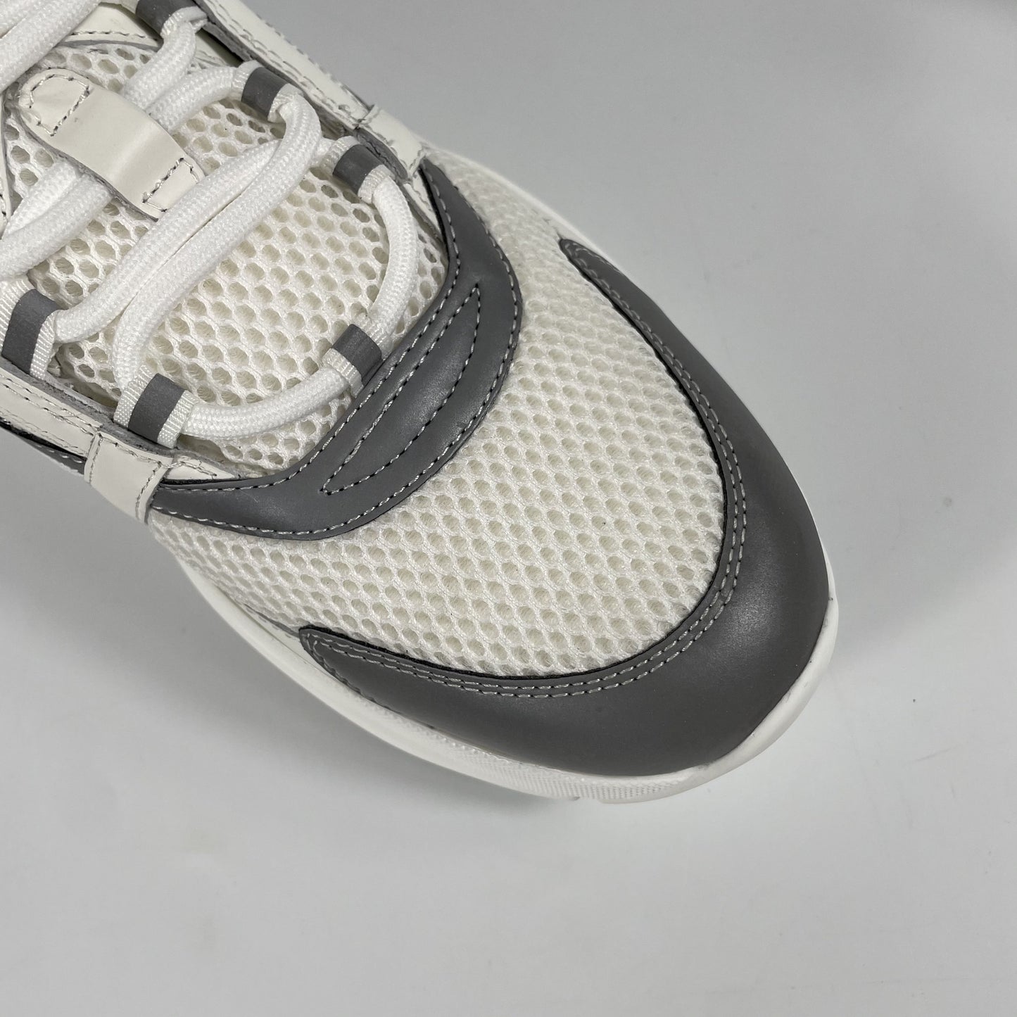 Dior B22 – Sneakers Bianche & Grigie